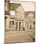 Exterior of a Shop with a Sign 'Auction & Negro Sales' in Whitehall Street, Atlanta, 1864-null-Mounted Giclee Print