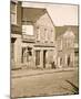 Exterior of a Shop with a Sign 'Auction & Negro Sales' in Whitehall Street, Atlanta, 1864-null-Mounted Giclee Print