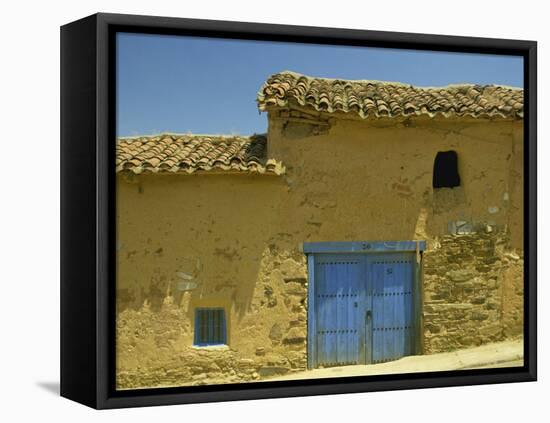 Exterior of an Adobe House with a Tile Roof and Blue Door, Salamanca, Castile Leon, Spain-Michael Busselle-Framed Stretched Canvas