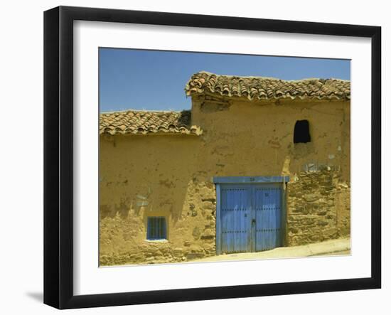 Exterior of an Adobe House with a Tile Roof and Blue Door, Salamanca, Castile Leon, Spain-Michael Busselle-Framed Photographic Print