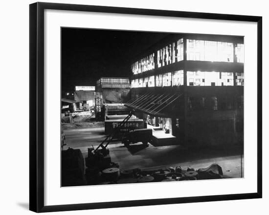 Exterior of Firestone Tire and Rubber Co. Plant at Night-null-Framed Photographic Print
