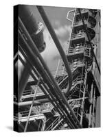 Exterior View of a Refinery and Factory-Andreas Feininger-Stretched Canvas