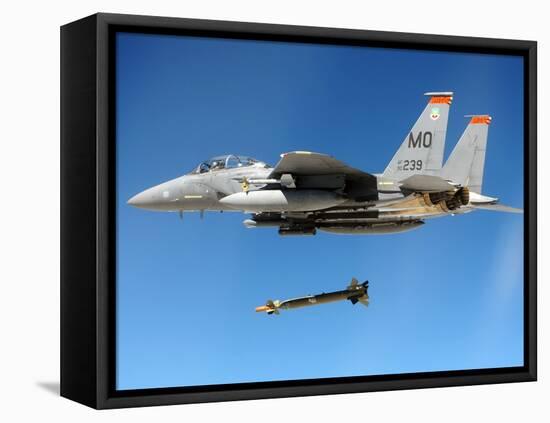 F-15 Strike Eagle Fighter Drops a Guided Bomb in Exercises, Ca. 1980s-null-Framed Stretched Canvas