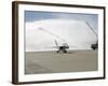 F-18 Aircraft Taxies Beneath the Spray from Fire Trucks-Stocktrek Images-Framed Photographic Print
