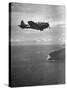 F-6 Hellcat Fighter Plane over Tanahmera Bay as Japanese Airfields at Hollandia, New Guinea-J^ R^ Eyerman-Stretched Canvas