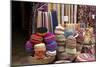 Fabrics, Tapestries, Cushions and Knitted Hats for Sale in the Souk, Essaouira, Morocco-Natalie Tepper-Mounted Photo