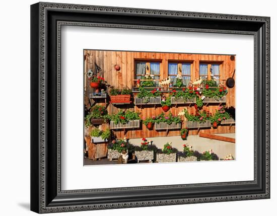 Facade of a Farmhouse decorated with Flowers, Beatenberg, Canton of Bern, Switzerland-null-Framed Art Print