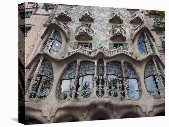 Facade of Casa Batllo by Gaudi, UNESCO World Heritage Site, Passeig de Gracia, Barcelona, Spain-Nico Tondini-Stretched Canvas