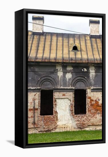 Facade of Old Abandoned House with Dark Windows in Slovakia-alexabelov-Framed Stretched Canvas