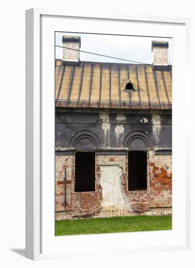 Facade of Old Abandoned House with Dark Windows in Slovakia-alexabelov-Framed Photographic Print