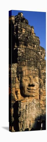 Face Carved on Rocks in a Temple, Bayon Temple, Angkor, Cambodia-null-Stretched Canvas