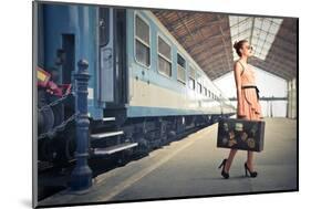Fair Traveler With Vintage Suitcase At The Station-olly2-Mounted Photographic Print