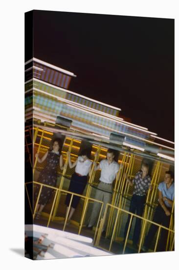 Fairgoers on a 'Round-Up' Spinning Amusement Ride at the Iowa State Fair, Des Moines, Iowa, 1955-John Dominis-Stretched Canvas