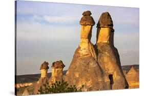 Fairy chimney rock formation in Goreme at sunset, Cappadocia (UNESCO World Heritage Site), Turkey-Keren Su-Stretched Canvas