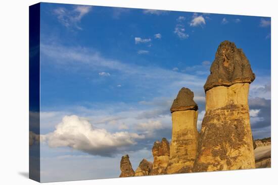 Fairy chimney rock formation in Goreme at sunset, Cappadocia (UNESCO World Heritage Site), Turkey-Keren Su-Stretched Canvas