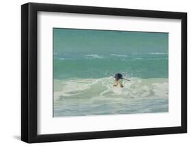 Falkland Islands, East Falkland. Gentoo Penguin Leaping in Surf-Cathy & Gordon Illg-Framed Photographic Print