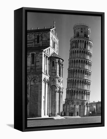 Famed Leaning Tower of Pisa Standing Next to the Baptistry of the Cathedral-Margaret Bourke-White-Framed Stretched Canvas