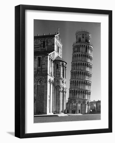 Famed Leaning Tower of Pisa Standing Next to the Baptistry of the Cathedral-Margaret Bourke-White-Framed Photographic Print