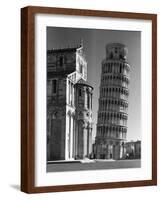 Famed Leaning Tower of Pisa Standing Next to the Baptistry of the Cathedral-Margaret Bourke-White-Framed Photographic Print