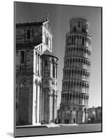 Famed Leaning Tower of Pisa Standing Next to the Baptistry of the Cathedral-Margaret Bourke-White-Mounted Photographic Print