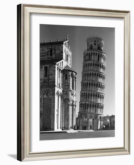 Famed Leaning Tower of Pisa Standing Next to the Baptistry of the Cathedral-Margaret Bourke-White-Framed Photographic Print