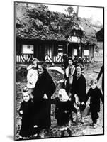 Families Leaving their Village Bombarded During the Normandy Landings, France, 1944-null-Mounted Giclee Print