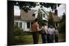 Family Admiring Home-William P. Gottlieb-Mounted Photographic Print