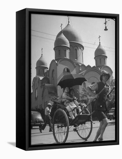 Family Being Pulled in a Rickshaw with a Russian Orthodox Church in the Background-Jack Birns-Framed Stretched Canvas