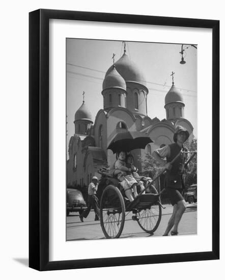 Family Being Pulled in a Rickshaw with a Russian Orthodox Church in the Background-Jack Birns-Framed Photographic Print