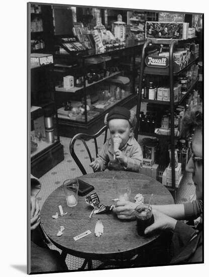 Family Eating at a Local Drugstore-null-Mounted Photographic Print