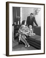 Family Group Looking at a Brochure, Doncaster, South Yorkshire, 1963-Michael Walters-Framed Photographic Print