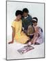 Family Group Looking at a Magazine, 1963-Michael Walters-Mounted Photographic Print