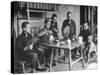 Family Having Tea in Courtyard-Carl Mydans-Stretched Canvas