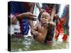 Family Members Give Bath to a Child after a Mundan or Head Tonsured Ceremony-null-Stretched Canvas