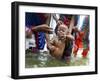 Family Members Give Bath to a Child after a Mundan or Head Tonsured Ceremony-null-Framed Photographic Print