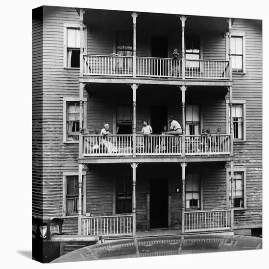 Family on Balcony of Apartment Building-Gordon Parks-Stretched Canvas