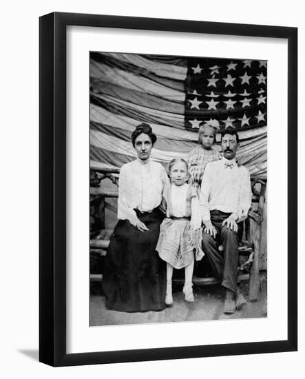 Family Pose in Front of American Flag, Ca. 1898-null-Framed Photographic Print