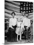 Family Pose in Front of American Flag, Ca. 1898-null-Mounted Photographic Print