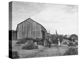 Family Praying During Farm Work-John Phillips-Stretched Canvas