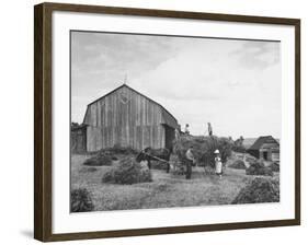 Family Praying During Farm Work-John Phillips-Framed Photographic Print