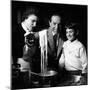 Family Preparing Fish and Pasta-null-Mounted Photo