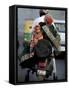 Family Rides on a Two-Wheeler in New Delhi, India-null-Framed Stretched Canvas