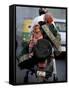 Family Rides on a Two-Wheeler in New Delhi, India-null-Framed Stretched Canvas