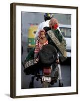 Family Rides on a Two-Wheeler in New Delhi, India-null-Framed Photographic Print