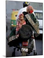Family Rides on a Two-Wheeler in New Delhi, India-null-Mounted Photographic Print
