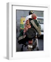 Family Rides on a Two-Wheeler in New Delhi, India-null-Framed Photographic Print