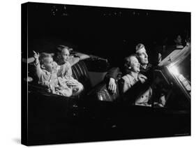Family Sitting in Convertible Watching Movie at Drive In-Francis Miller-Stretched Canvas