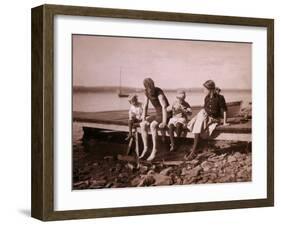 Family Sitting on Dock-null-Framed Art Print