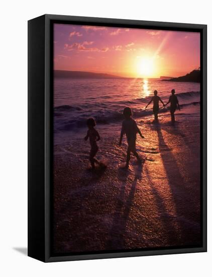 Family Walking on Beach at Dusk, HI-Mark Gibson-Framed Stretched Canvas