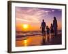 Family Walking on the Beach at Sunset-Rawpixel-Framed Photographic Print